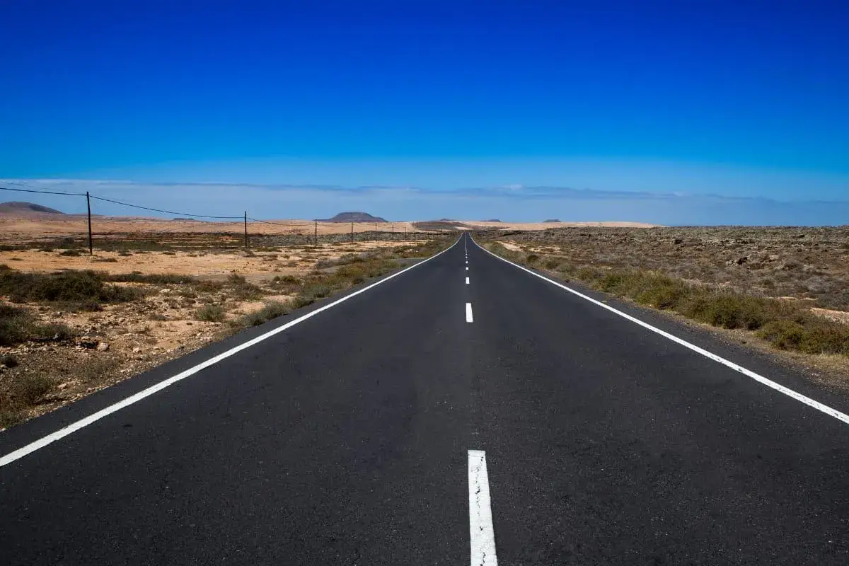 Luxury GMC Yukon chauffeur on the Saudi Arabian desert highway