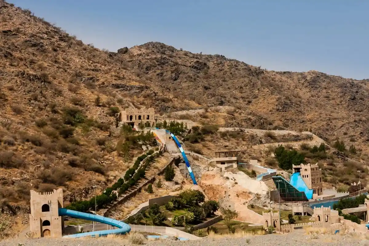 Luxury SUV chauffeur service in the mountainous landscape of Taif Saudi Arabia