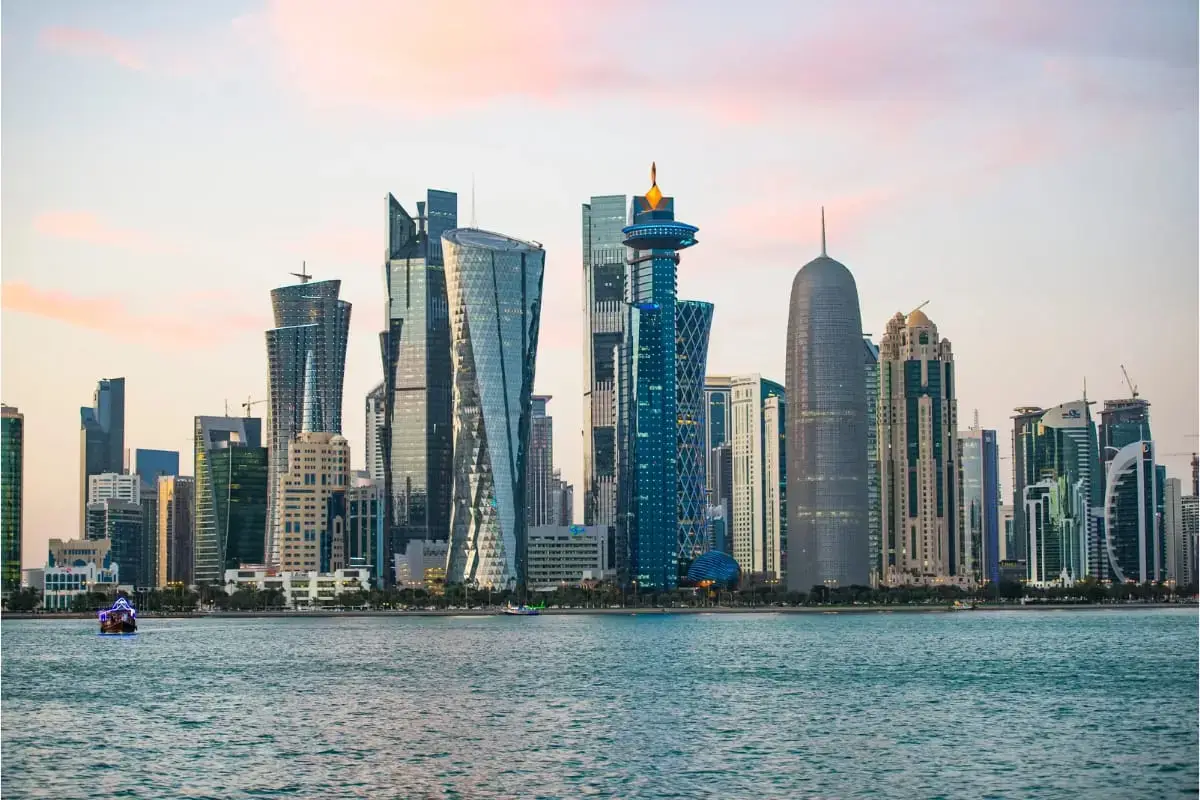 VIP chauffeur arriving at the Doha skyline from Riyadh